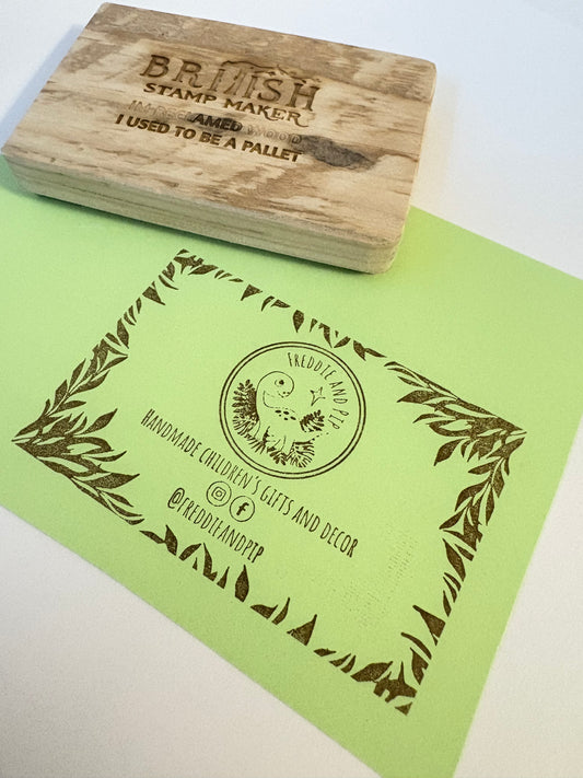 Freddie and pip business card rubber stamp with a leafy boarder, this stamp contains custom text and instagram and facebook icons and customers social media handle.